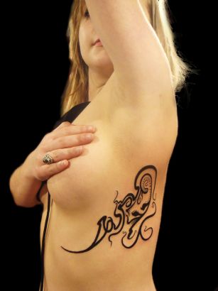 Tribal Tattoo On Side Back